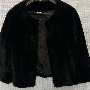 Brand new Elegant Black Faux Fur Jacket with pockets.